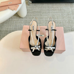 Black High Heels With Silver Bow