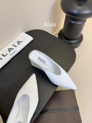 ALAIA HIGH MULES 25S IN WHITE SATIN