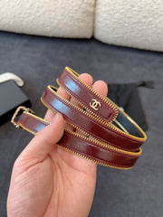 BELT 20MM IN WINE RED CALFSKIN WITH INTERWOVEN CHAIN BUCKLE ZIPPER IN TRIM GOLD HARDWARE