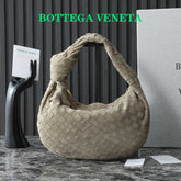 BOTTEGA VENETA 25S SMALL JODIE 36 IN MUTED TAUPE SUEDE GOLD HARDWARE