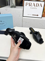 PRA CROSS MULE HEELS IN BLACK CALFSKIN WITH PADDED STRAPS