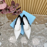 PRA BRUSHED PUMPS WHITE AND BLACK CALFSKIN