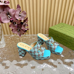 HORSEBIT SLIDE SANDAL IN SKY BLUE MONOGRAM CANVAS AND SHEEPSKIN LINING