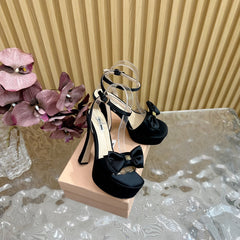 HIGH BOW PLATFORM IN BLACK SILK