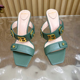 BALMAIN 25S MULES IN STRIPED LEATHER 95MM IN DUSTY GREEN CALFSKIN GOLD HARDWARE