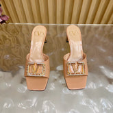 VALENTINO 25S HIGH-HEEL MULES 60 MM IN WARM BEIGE PATENT CALFSKIN WITH CRYSTAL-EMBELLISHED STRAP