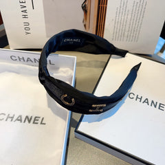 BLACK SILK HAIRBAND WITH GOLD LOGO 412441