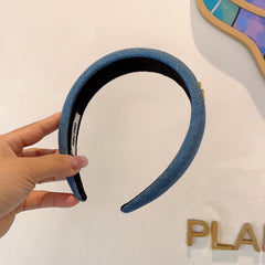 THICK HEADBAND IN AZURE BLUE DENIM GOLD LOGO 425464
