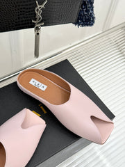 ALAIA FLAT MULE IN LIGHT PINK LAMBSKIN