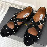 CROSSED STRAP BALLET FLATS IN BLACK SUEDE