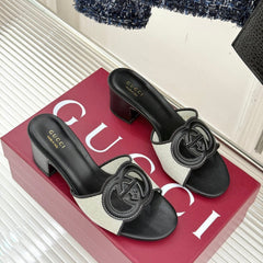 MID-HEEL MULE IN BLACK CALFSKIN AND CREAM WHITE FABRIC