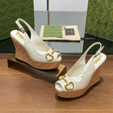 GG WEDGE PLATFORM IN WHITE CALFSKIN WITH GOLD HARDWARE
