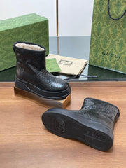 GG UGG BOOTS IN BLACK EMBOSSED DEERSKIN AND BEIGE WOOL LINING