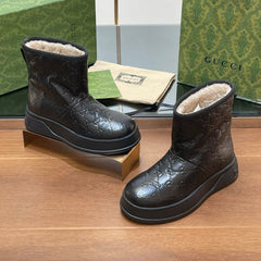 GG UGG BOOTS IN BLACK EMBOSSED SUEDE AND BEIGE WOOL LINING