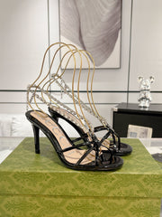 STRAPPY SANDAL WITH RHINESTONE CHAIN IN BLACK PATENT LEATHER