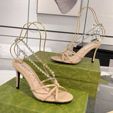 STRAPPY SANDAL WITH RHINESTONE CHAIN IN BEIGE PATENT LEATHER