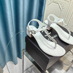 CLASSIC THONG SANDALS WHITE LAMBSKIN WITH PEARL BUCKLE