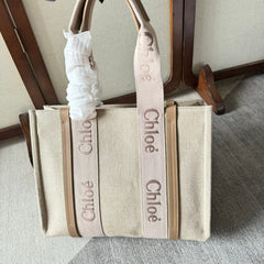 MEDIUM WOODY TOTE BAG 37 IN BEIGE LINEN CANVAS LIGHT PINK WEBBING LOGO EMBROIDERY