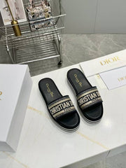 CD DWAY PLATFORM SLIDE IN BLACK AND WHITE COTTON STRIPED SOLE