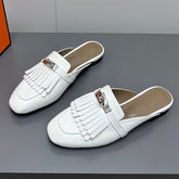 0Z MULE IN WHITE LAMBSKIN WITH FRINGE DETAIL