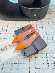 ALAIA FLAT SLINGBACK IN TIGER ORANGE PATENT CALFSKIN AND FILM