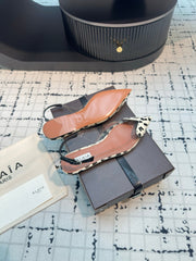 ALAIA FLAT SLINGBACK IN BLACK MIX WHITE PATENT CALFSKIN AND FILM