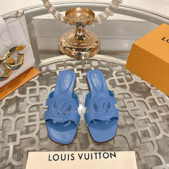 ISOLA FLAT SLIDE IN CORNFLOWER BLUE CALFSKIN