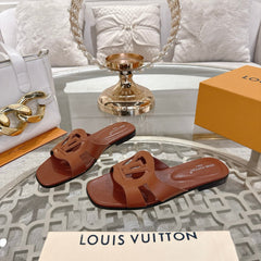 ISOLA FLAT SLIDE IN PENNY BROWN CALFSKIN