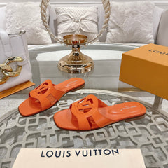 ISOLA FLAT SLIDE IN VIVID ORANGE CALFSKIN