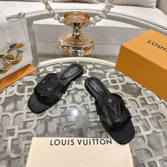 ISOLA FLAT SLIDE IN BLACK CALFSKIN