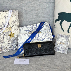 VERTICAL LONG ZIP WALLET 20 IN BLACK QUILTED ALLOVER CALFSKIN