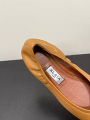 ALAIA BALLET FLATS IN COPPER BROWN SMOOTH CALFSKIN