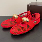 ALAIA BALLET FLATS IN CHERRY RED MESH FISHNET WITH GOLD HARDWARE