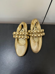 ALAIA SPHERE BALLET FLATS IN GOLDEN LAMBSKIN