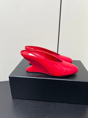 ALAIA WEDGE MULES 25S IN RED LAMBSKIN