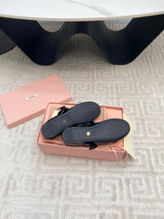 BOW MARY JANE FLAT IN BLACK NAPLAK LAMBSKIN