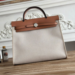 ZIP CABINE 31 BAG IN PALE GRAY CANVAS AND BRONZE BROWN CALFSKIN