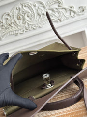 ZIP CABINE 31 BAG IN OLIVE GREEN CANVAS AND BLACK CALFSKIN