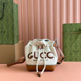 SMALL DRAWSTRING SHOULDER BAG 21 IN WHITE CANVAS BROWN CALFSKIN