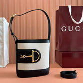 73 SMALL BUCKET BAG 20 IN NATURAL CANVAS AND BLACK CALFSKIN