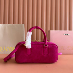 ARCADIE BAG 27 IN FUCHSIA SUEDE GOLD HARDWARE