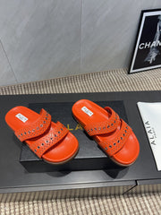 ALAIA DOUBLE-STRAP SANDALS 25S IN ORANGE CALFSKIN