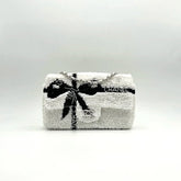 CHANEL 25S FLAP BAG 20 CM IN WHITE SEQUINS WITH BLACK BOW