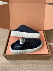 WASH SNEAKER MULES IN DARK NAVY DENIM