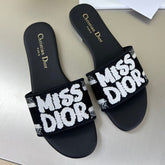 DWAY SLIDE EMBROIDERED COTTON AND BLACK MISS DIOR ALLOVER MOTIF