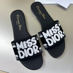 DWAY SLIDE EMBROIDERED COTTON AND BLACK MISS DIOR ALLOVER MOTIF
