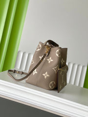 CRAFTY NEONOE 26 IN BROWN AND CREAM BICOLOR EMPREINTE CALFSKIN