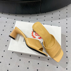 SQUARE-TOE MEDIUM HEEL MULES IN APACHE CALFSKIN LOGO EMBOSSED