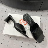 SQUARE-TOE MULES MEDIUM HEEL IN BLACK CALFSKIN LOGO EMBOSSED