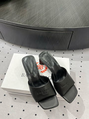 SQUARE-TOE MULES MEDIUM HEEL IN BLACK CALFSKIN LOGO EMBOSSED